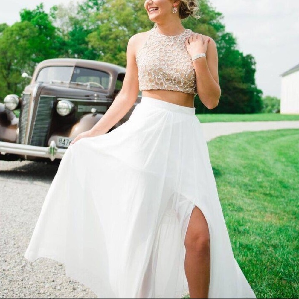 This is a two piece prom dress white/nude w gems